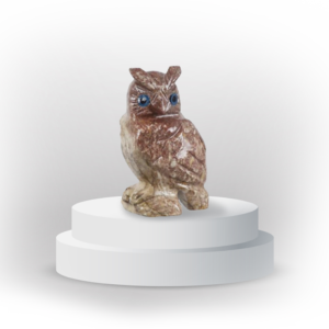 Owl animal totem in dolomite, and made in Peru, symbolizing wisdom and protection.